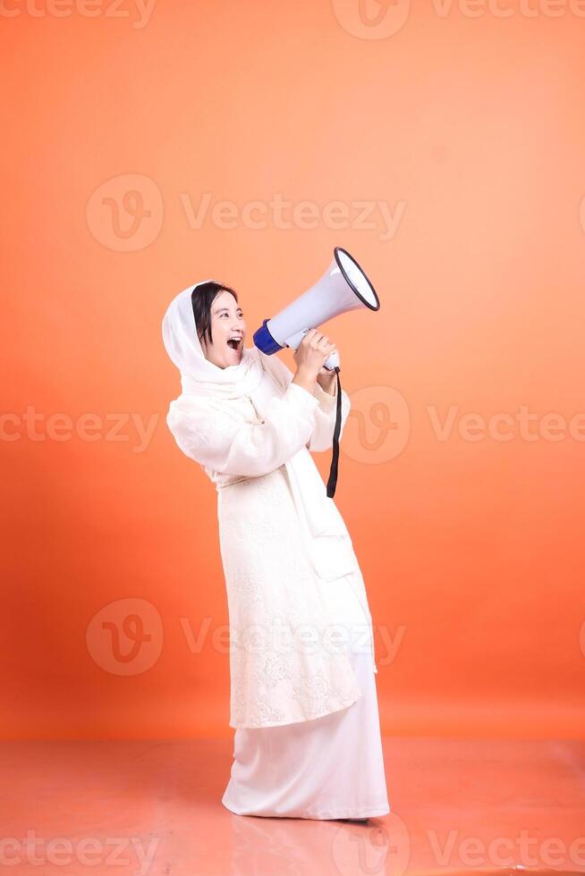 Vocal Advocate, Woman with megaphone making a passionate announc photo