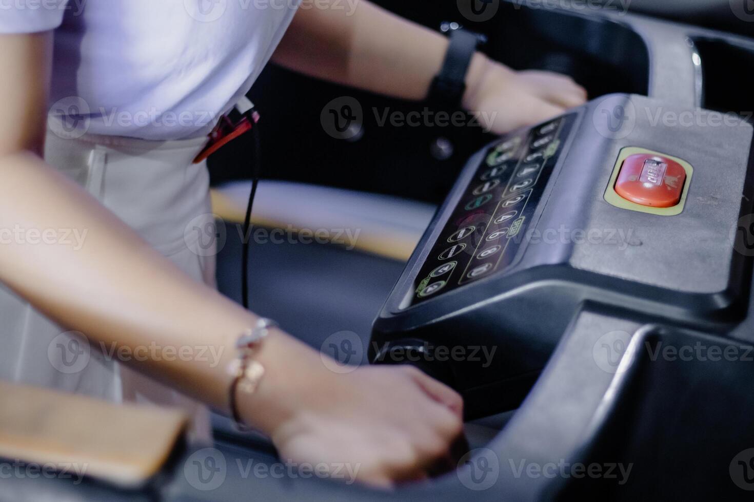 Activating Cardio Machine Person Interacting with Treadmill Con photo
