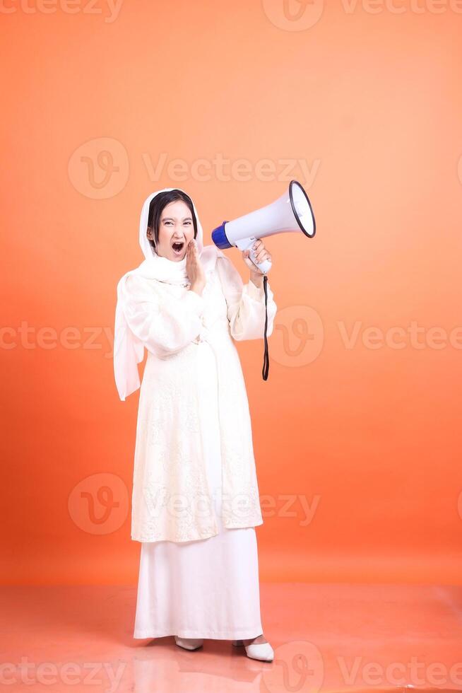 Amplified Voice, Muslim Woman with Megaphone, Standing Firm, exp photo
