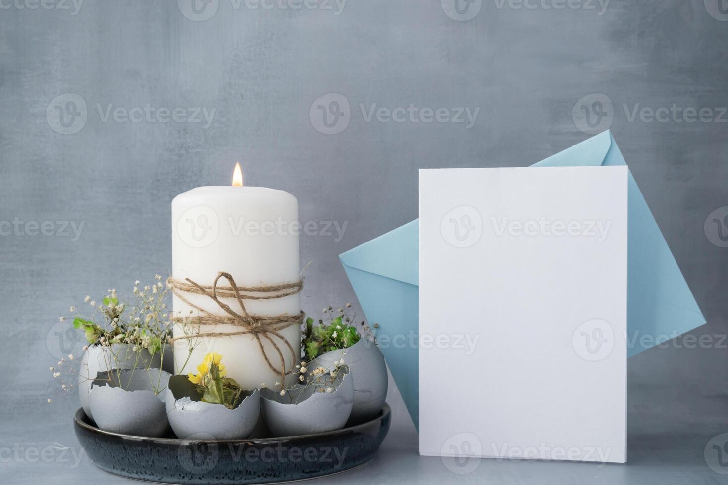 Easter mock up envelope empty card template Creative handmade Easter table decoration with egg shells instruction candle. Easter home decoration. Seasonal sustainable recycled decor photo