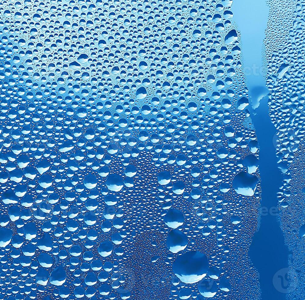 Water drops, close-up on glass photo