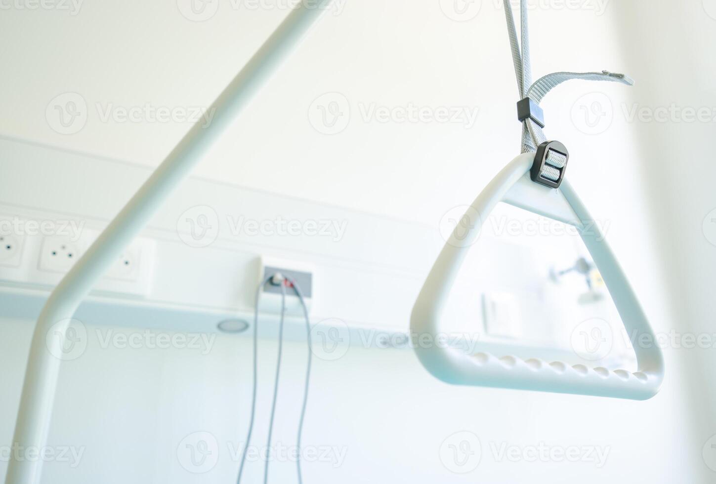 Grab Bar for Assistive Use in a Bright, Clean Medical Facility Room During Daylight Hours photo