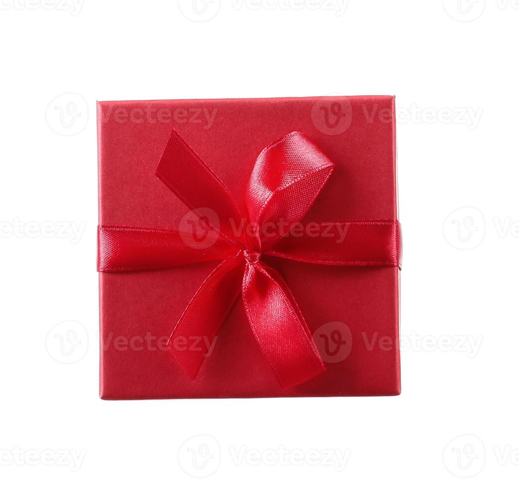 Red gift box with ribbon isolated on white background photo