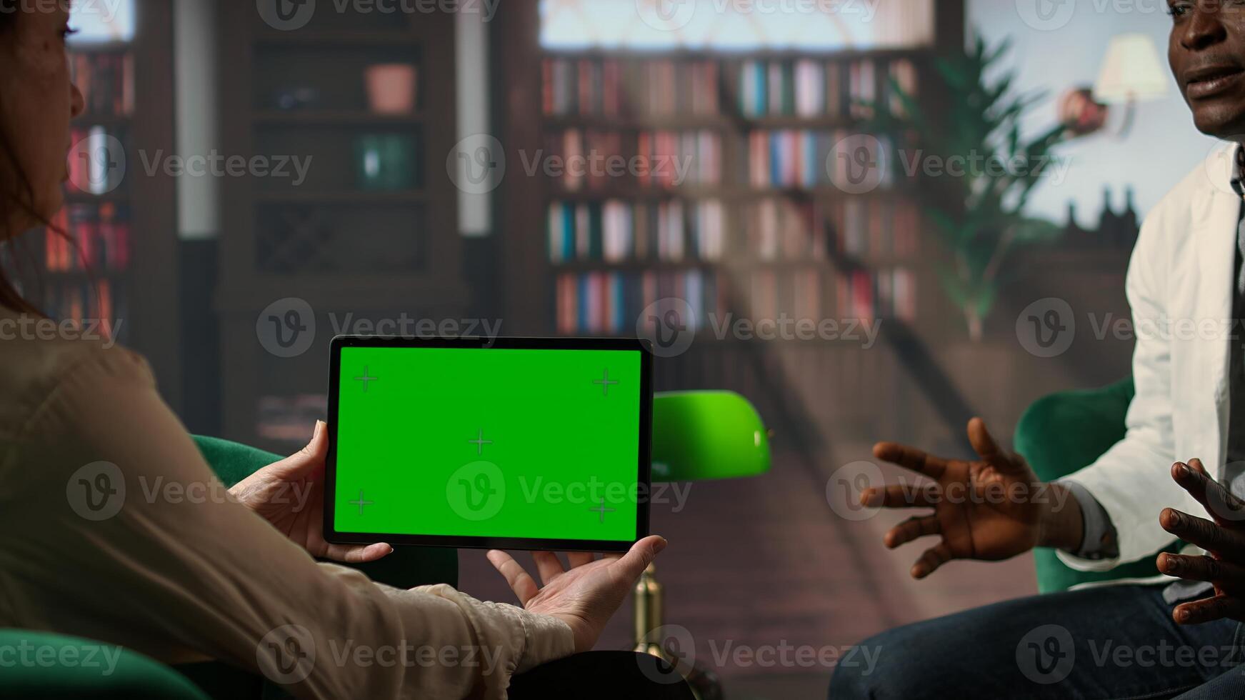 Medic sharing his feelings next to green screen, PTSD and frustration that comes with medical career. Doctor suffering after losing patients, mental health. Camera A. photo
