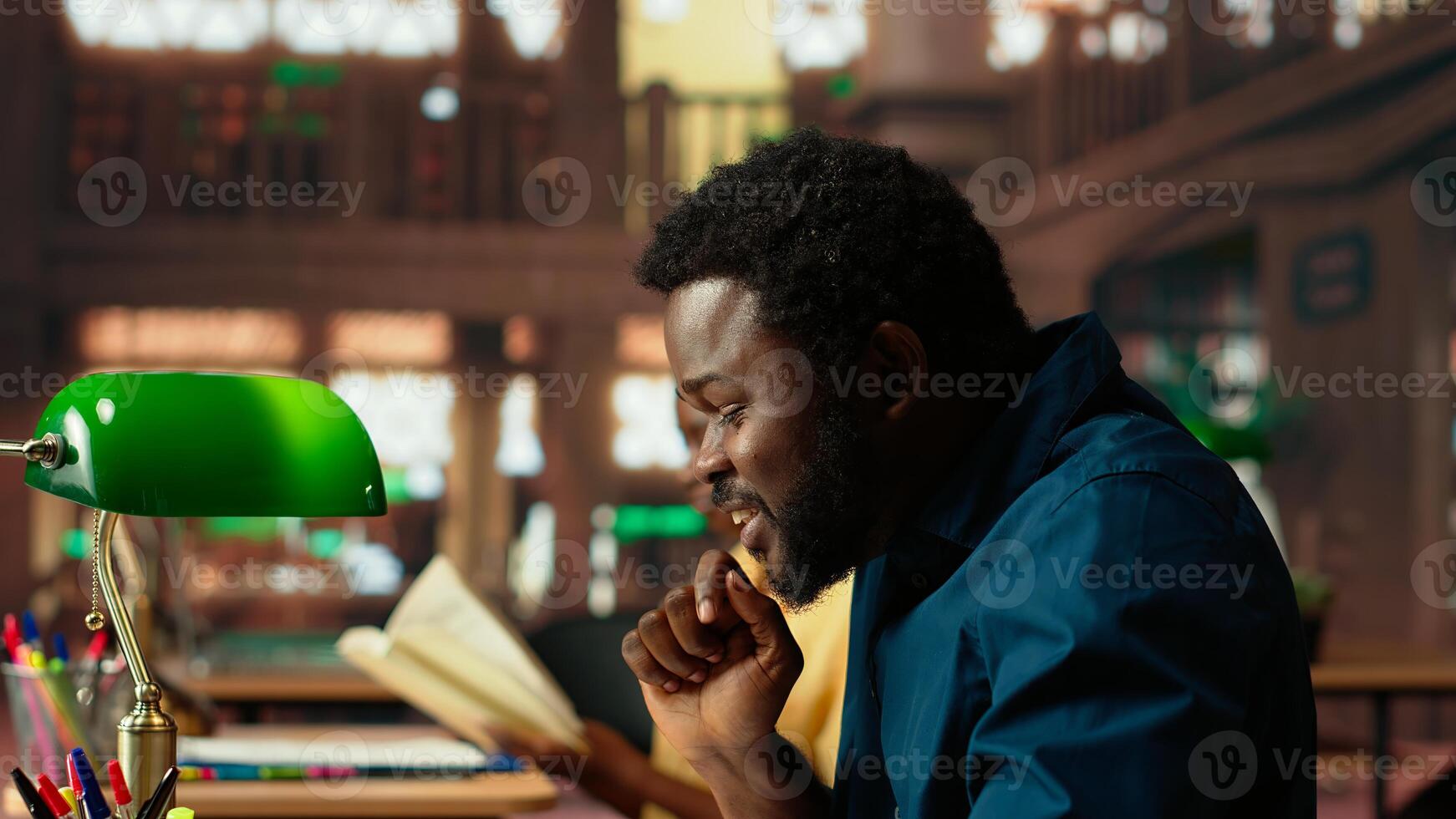 Stressed student feeling frustrated about the academic struggles of memorizing class notes for upcoming exam. Pupil being upset and worried about his grades, burnout. Camera B. photo