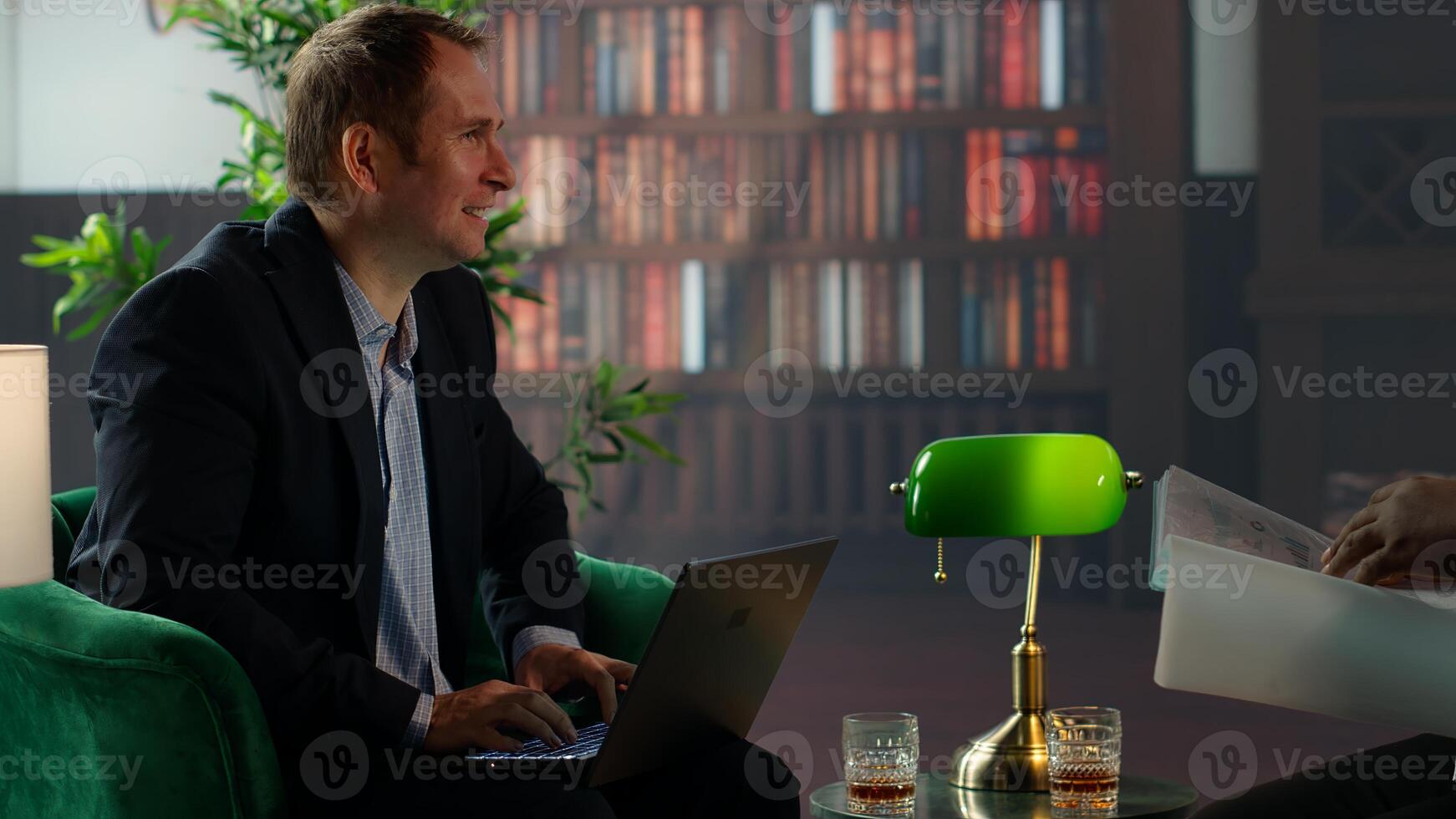 Diverse secret agents analyzing evidence and paperwork in HQ library, emphasizing strategic thinking to accomplish national safety surveillance mission. Critical documents. Camera B. photo