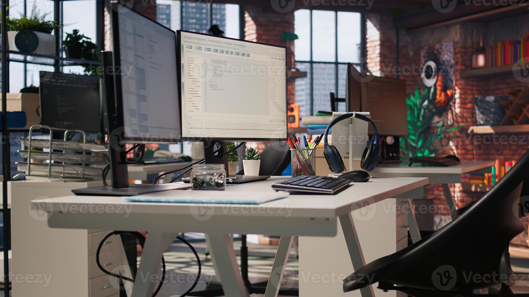Empty AI tech agency providing custom software development services. Technology venture workspace using machine learning to streamline coding process in startup office, jib down shot photo