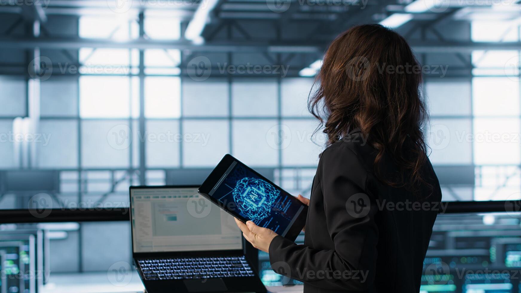 Technician using AI tech on tablet to adjust power management settings. Engineer in server room optimizes resource utilization using artificial intelligence, camera A photo