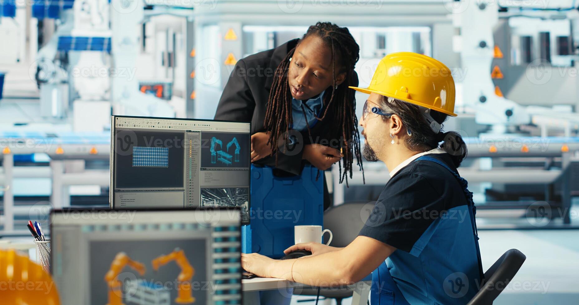 Photovoltaics engineer making facility adjustment in CAD program, showing woman. Solar panels technician designing assembly lines, informing african american manager, camera B photo