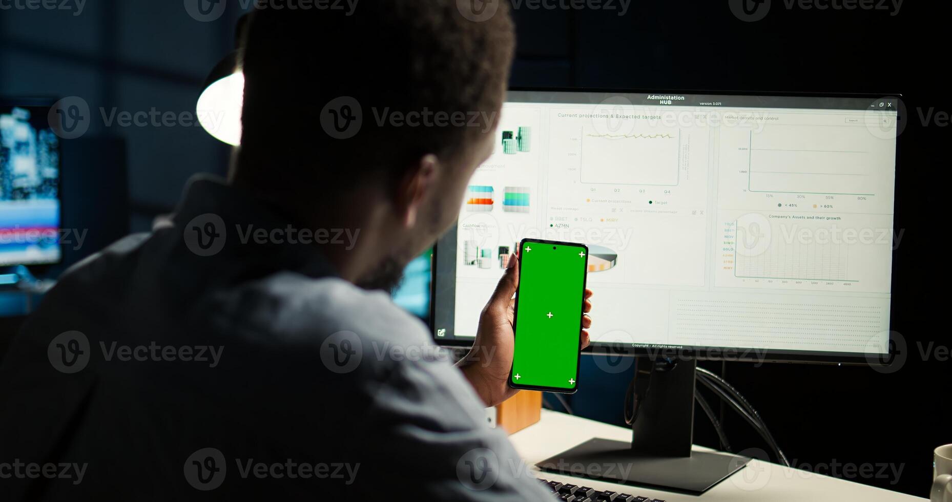 Financial manager doing accounting work on pc with chroma key screen, examining expenses for legal analysis at home. African american advisor working on reducing monthly costs. Camera A. photo