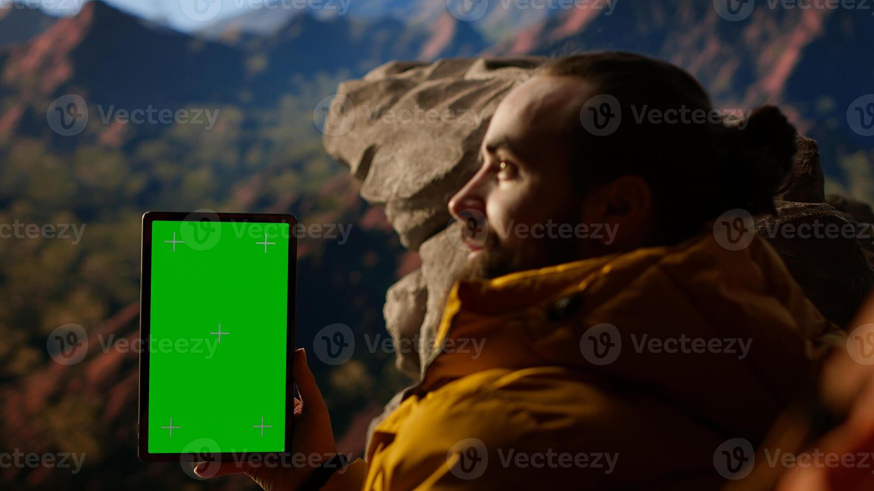 Climber admires breathtaking mountain peak with copy space screen, joyous stance embodies determination, endurance, and personal fulfillment that comes with overcoming challenges. Camera B. photo