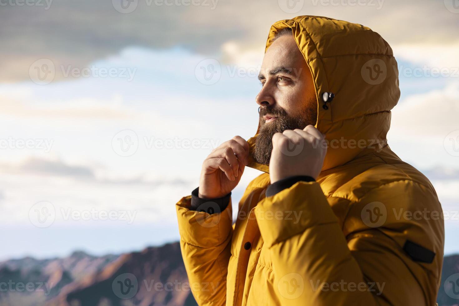 Young trekker embraces challenge of mountain hiking with fresh air and epic view serving as reminder of personal strength and thrill of conquering fears. Seeking adventure. photo