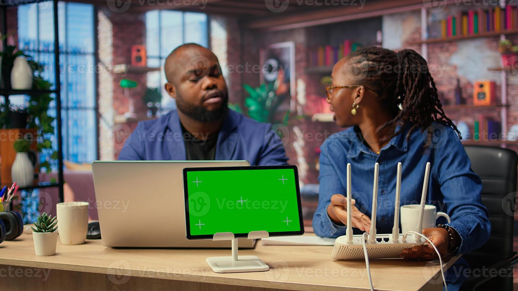 Irritated people trying to fix ongoing Wi Fi problem by rebooting modem next to copy space, troubleshooting connection errors and testing different network configurations. Camera A. photo