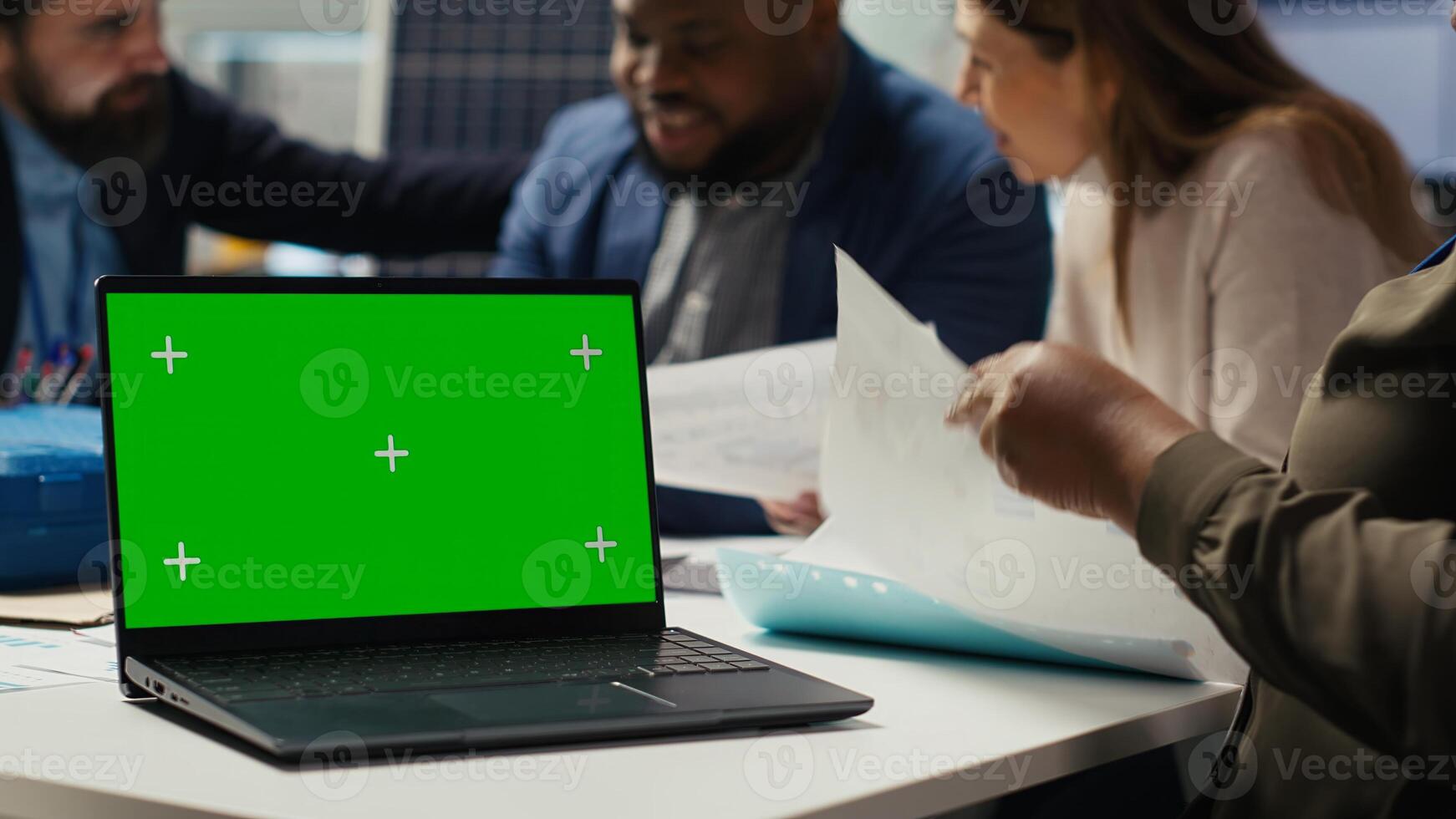 Industrial plant manager typing on green screen laptop, preparing paperwork for business meeting. Factory executive working on pitch for investors using chroma key device, automating production photo