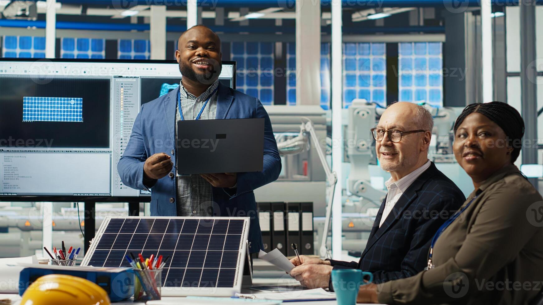 Portrait of smiling photovoltaics scientists experimenting with advanced PV materials to improve solar panel durability. Researchers developing efficient sustainable energy solutions, camera B photo