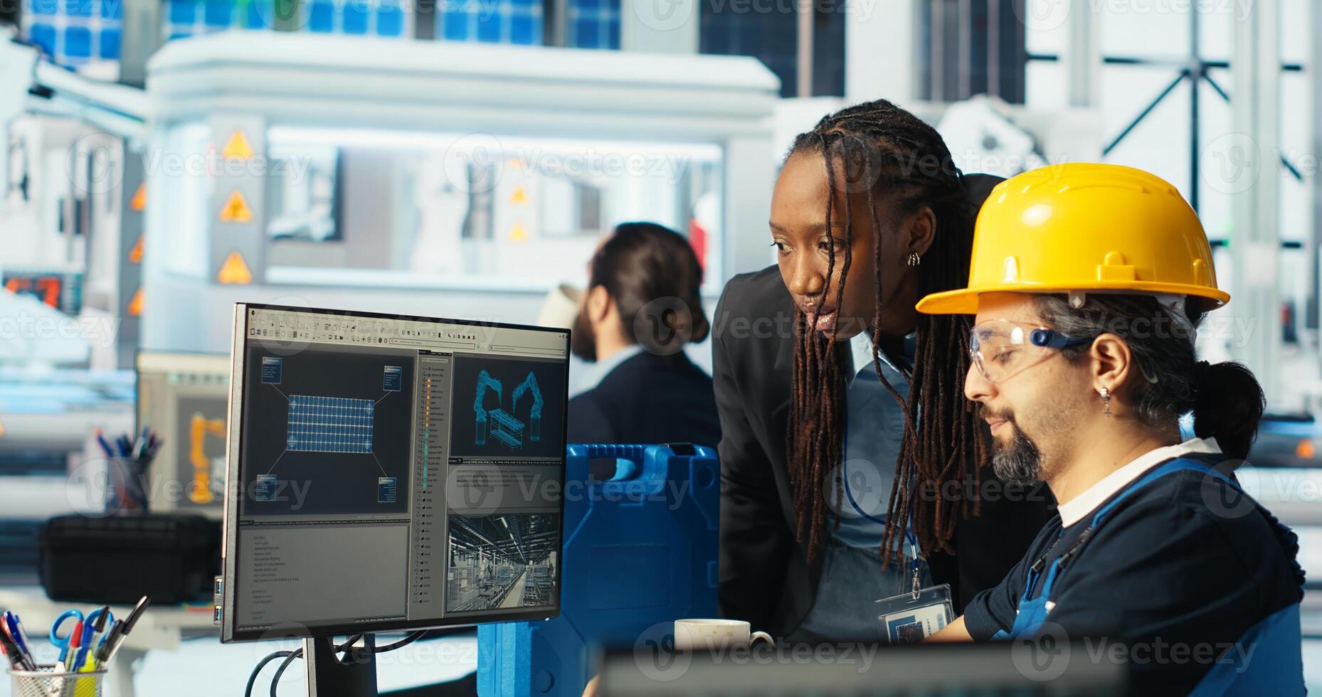 Solar panels expert instructing technician how to best harness sun power. Photovoltaics factory researcher shows worker how to improve efficiency, camera B photo