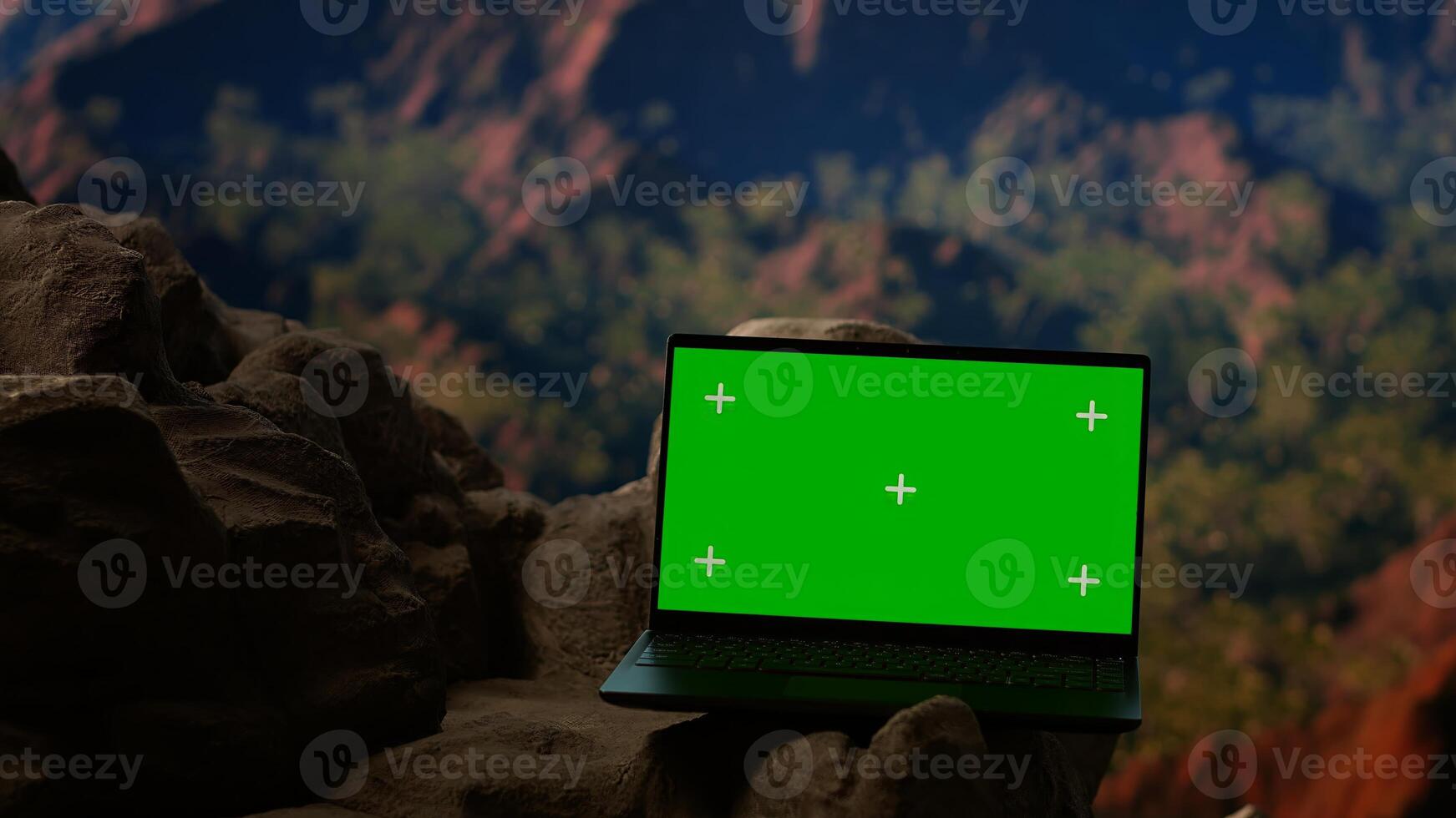 Dramatic mountain range stretching across horizon with green screen, offering spectacular scenic views for hikers and adventurers. The rugged terrain is a challenge worth conquering. photo