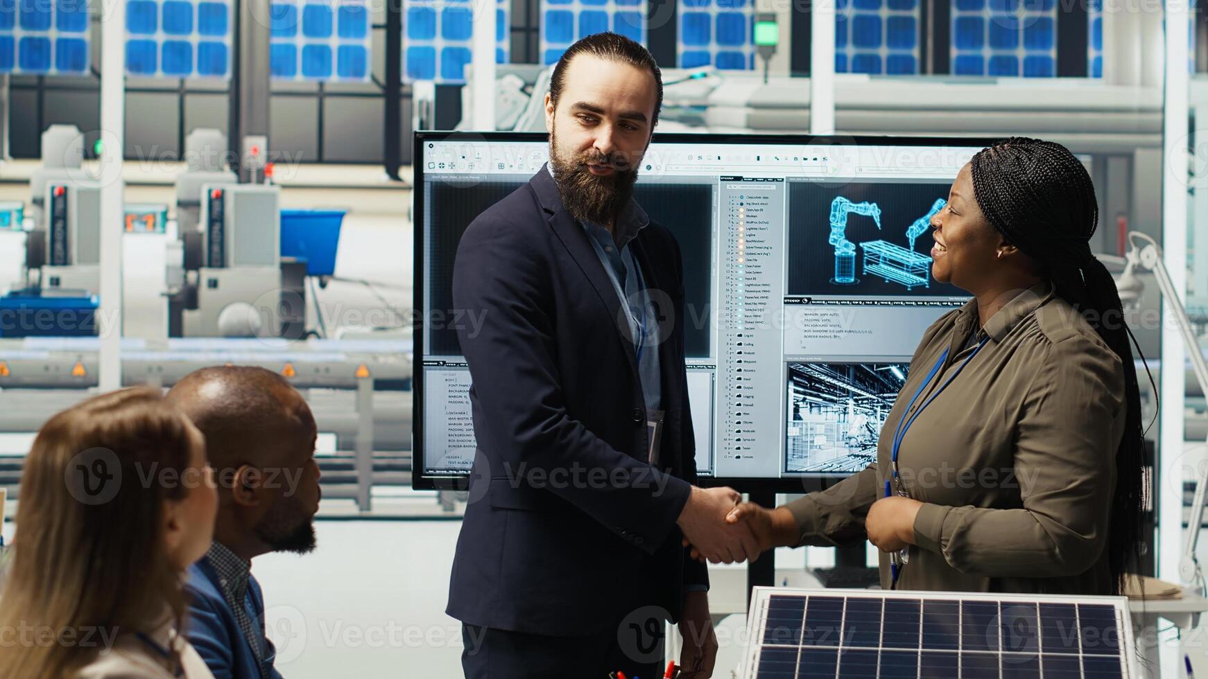 Managers in photovoltaics factory reviewing solar technology reports. Shareholders reading and discussing future investment opportunities in green energy production, camera B photo