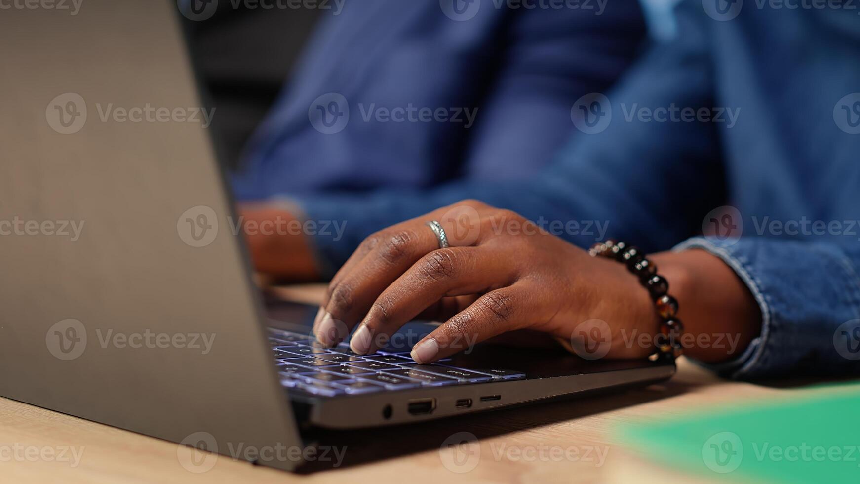 Couple at desk reading research papers and multitasking with laptop at home office, diving into professional or personal topics of improvement. Self employed people review analysis. Camera B. photo