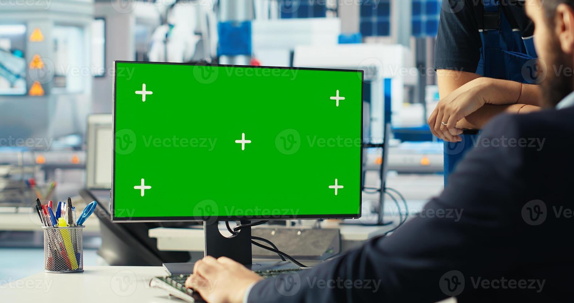 Factory staff member analyzing data on isolated screen PC, reviewing system metrics. Solar panels plant employee troubleshooting technical issues using mockup computer display photo