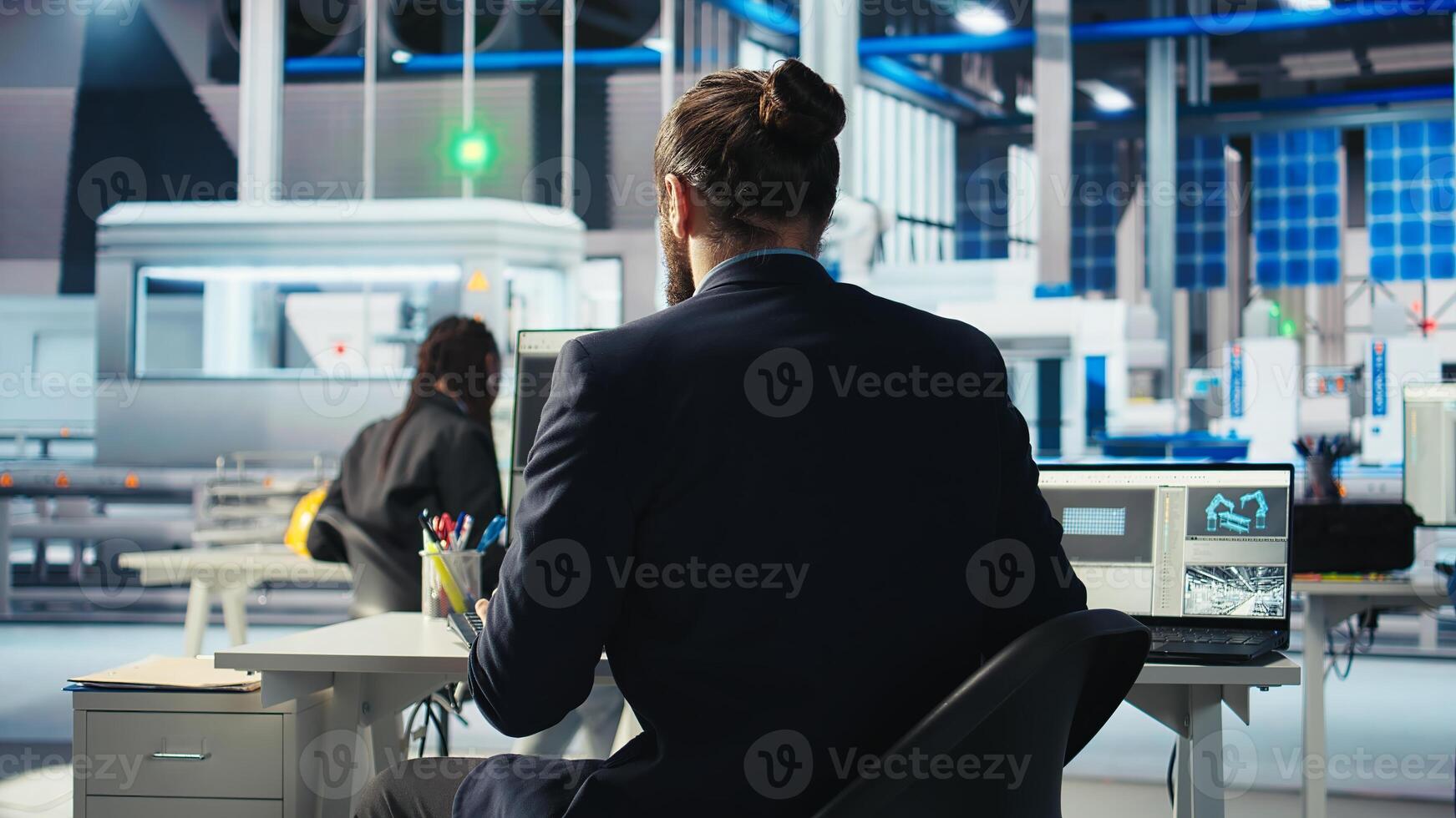 Photovoltaics engineer using software on laptop to improve solar panels efficiency. Smart manufacturing plant employee researching sustainable energy solutions using notebook, camera A photo