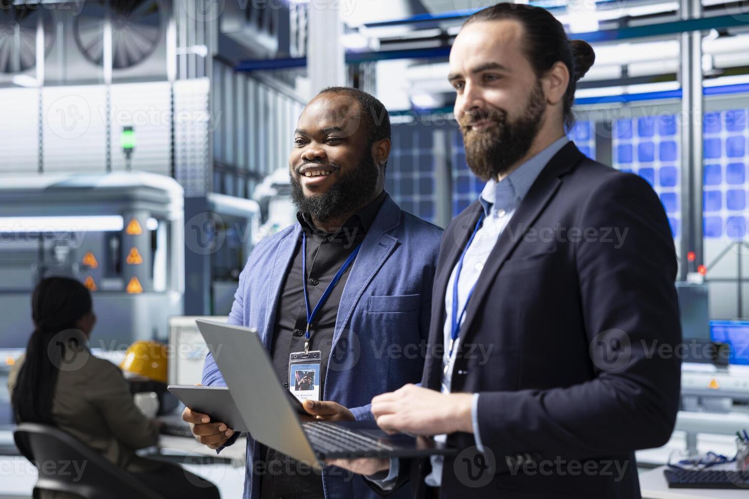 Factory inspectors and supervisors engaging in briefing over production metrics, supporting industrial innovation and sustainable process improvement. Solar power manufacturing. photo