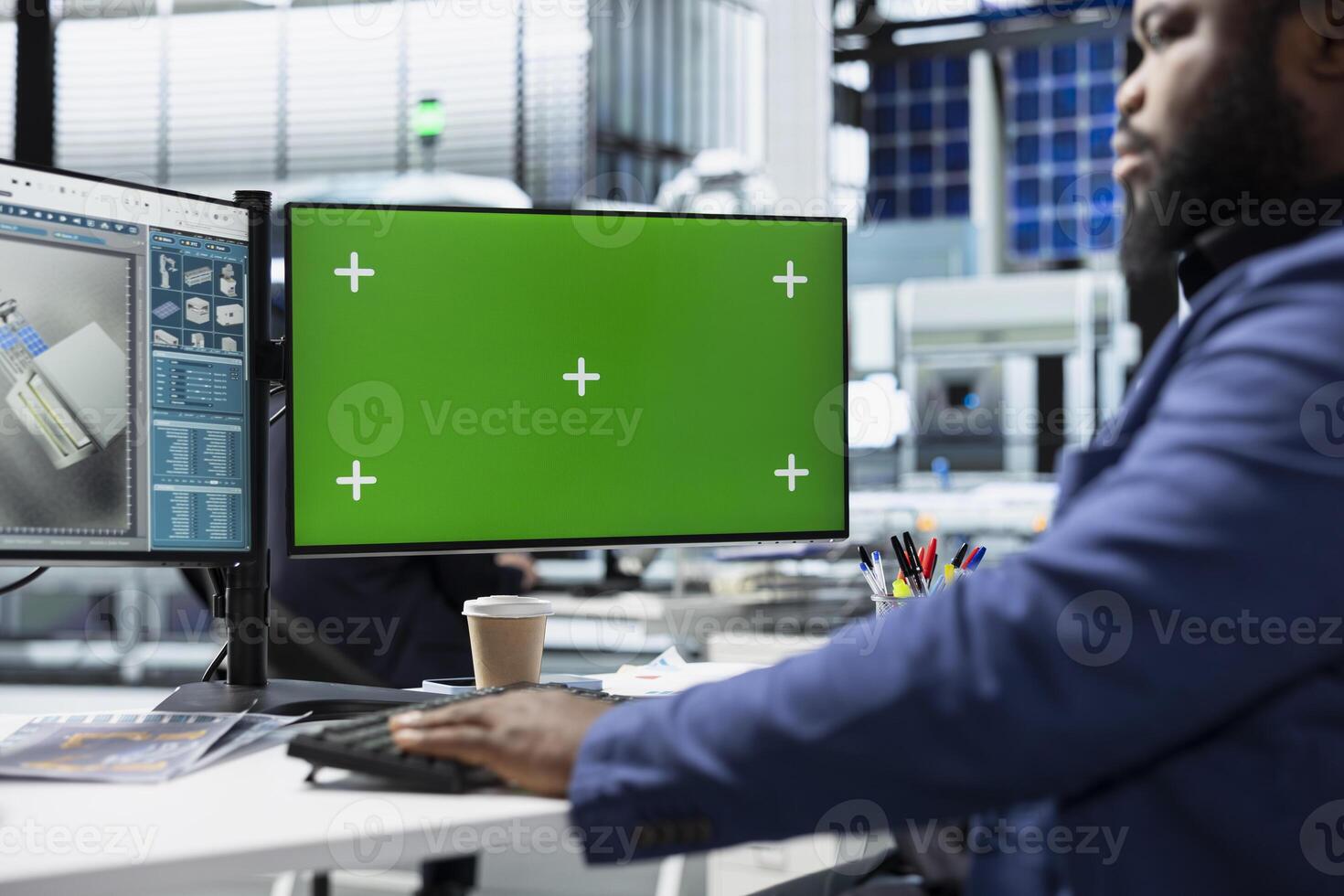 Solar plant employee records inspection notes next to chroma key, actively supporting renewable power goals through precision and workplace accountability. Managing the production. photo
