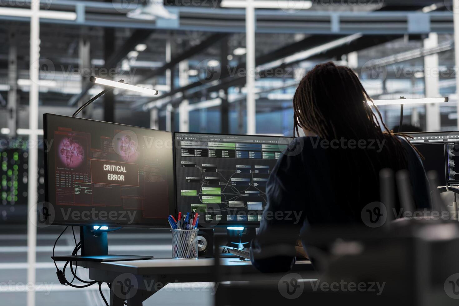 Data center engineer finding critical error in equipment used for machine learning training. Server farm IT expert fixing bugs in computer code affecting artificial intelligence systems performance photo