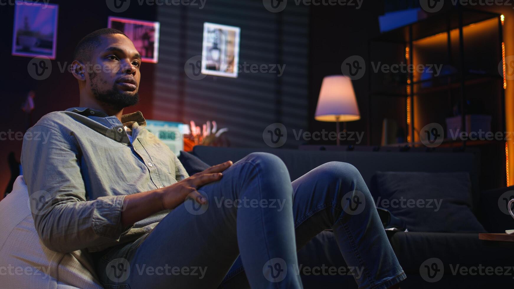 African american guy engaging in a virtual workshop to learn skills for new job, interacting with the coach. Ambitious man joining an interactive web learning session for development. Camera A. photo