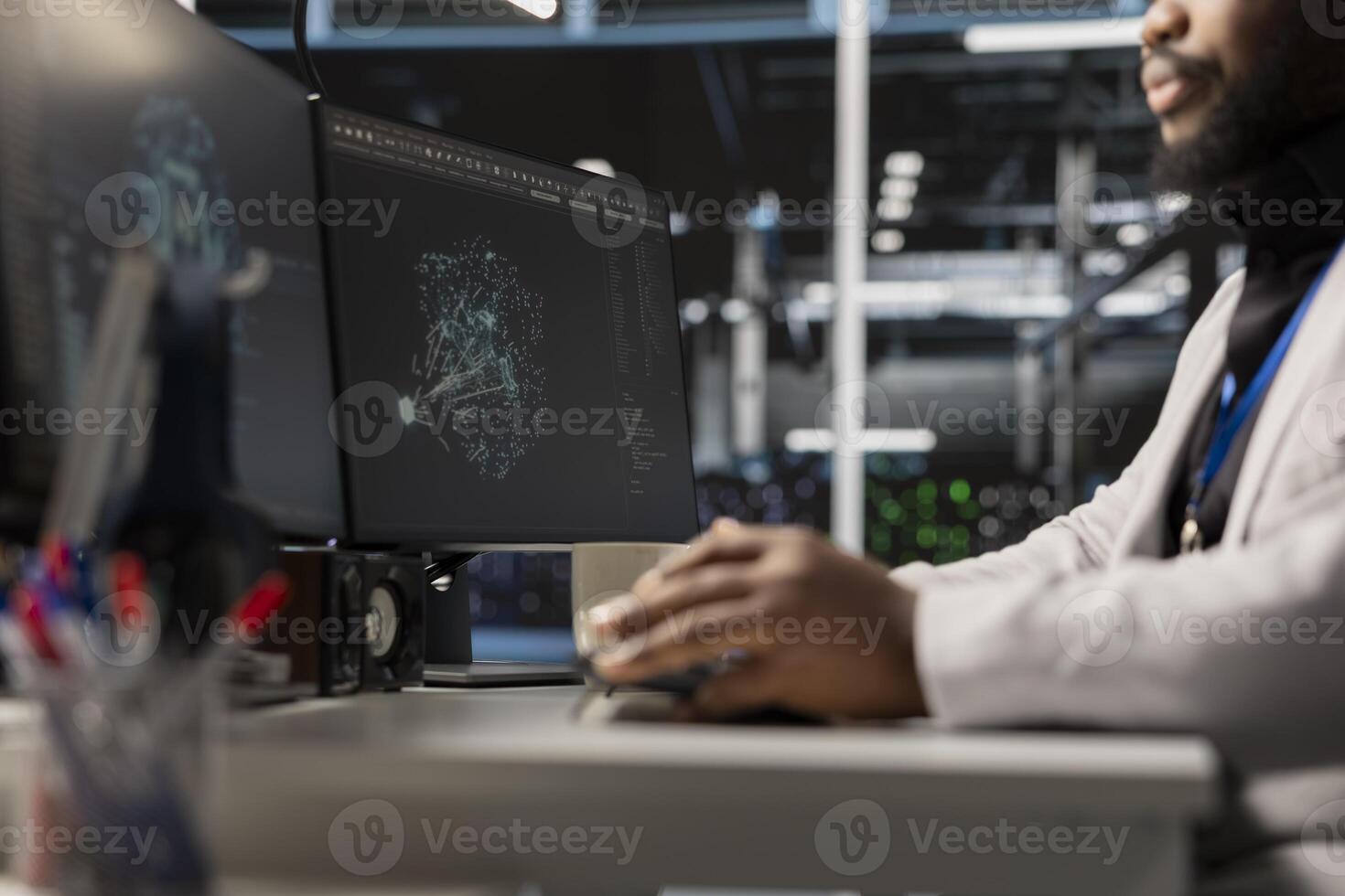 Close up of programmer in data center using AI powered tech to run simulations. IT expert coding cognitive computing algorithms to extract insights from data and automate rigs photo