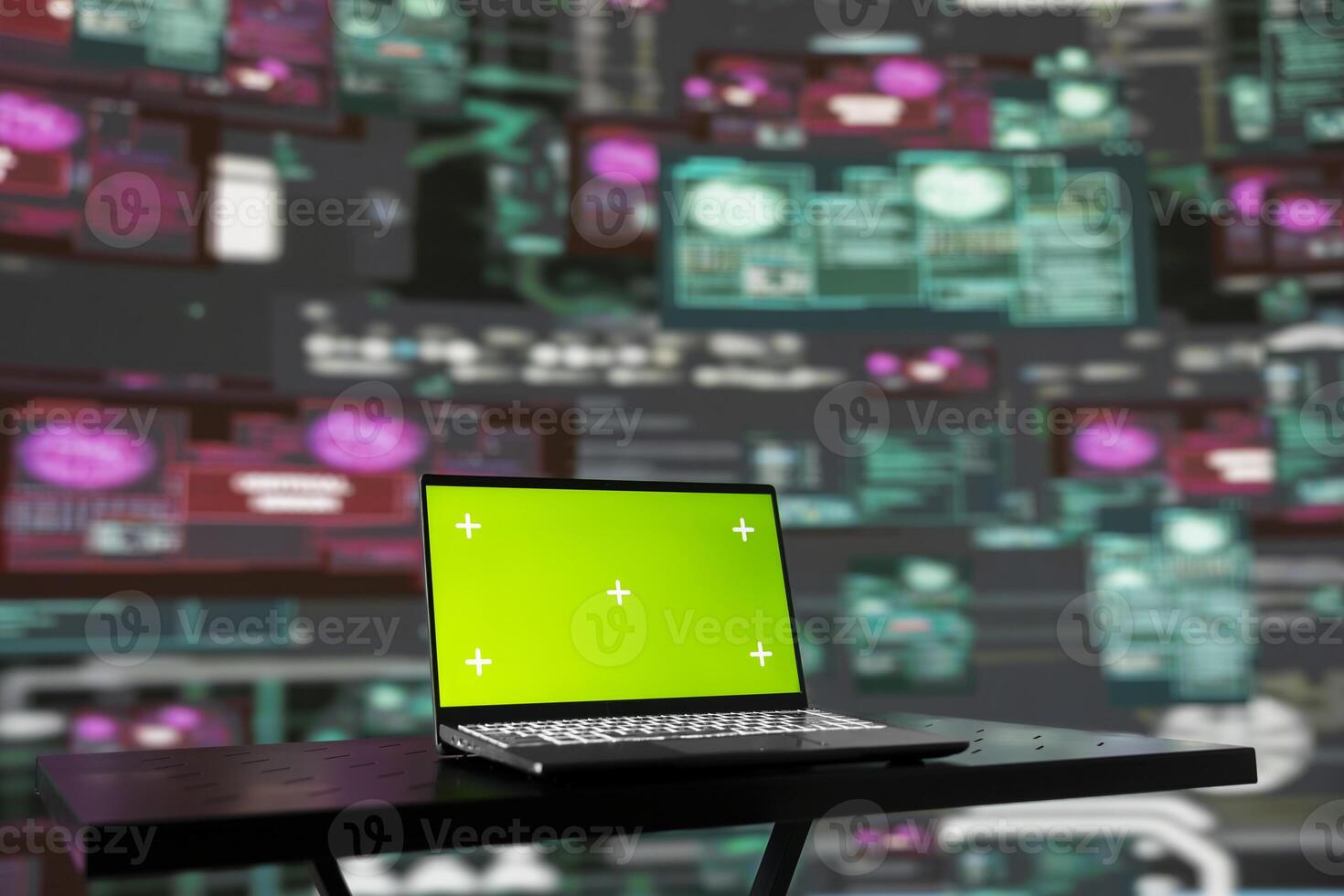 Scene reveals the strategy behind cyber attacks with chroma key on pc, malware and encryption weaknesses are exploited by hackers seeking to gain secure system access. Virtual threat. photo