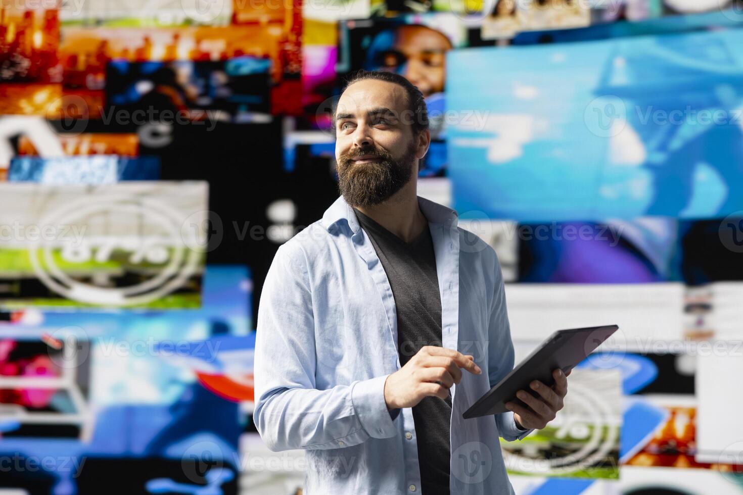 Casual man admires social media visuals and user interface elements highlighting the power of communication and influence in the digital world. Modern user experience and web design. photo