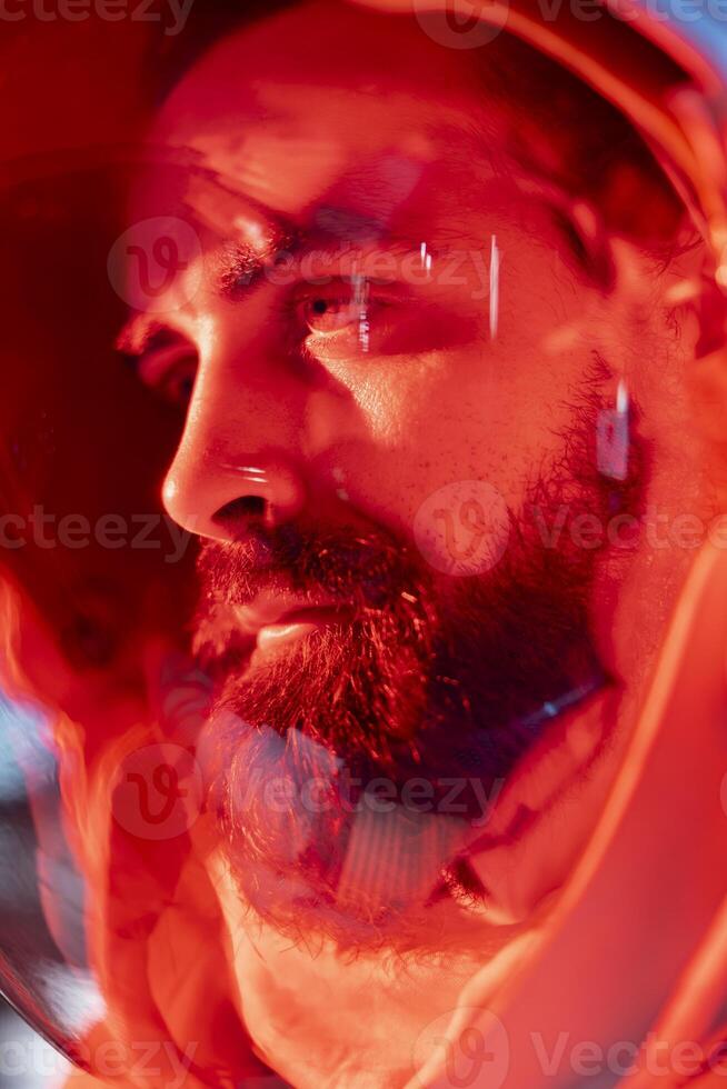 Close up of sick cosmonaut starting to lose consciousness from low oxygen levels after life support malfunction. Damaged spaceship crew member blacking out from environmental hazard photo