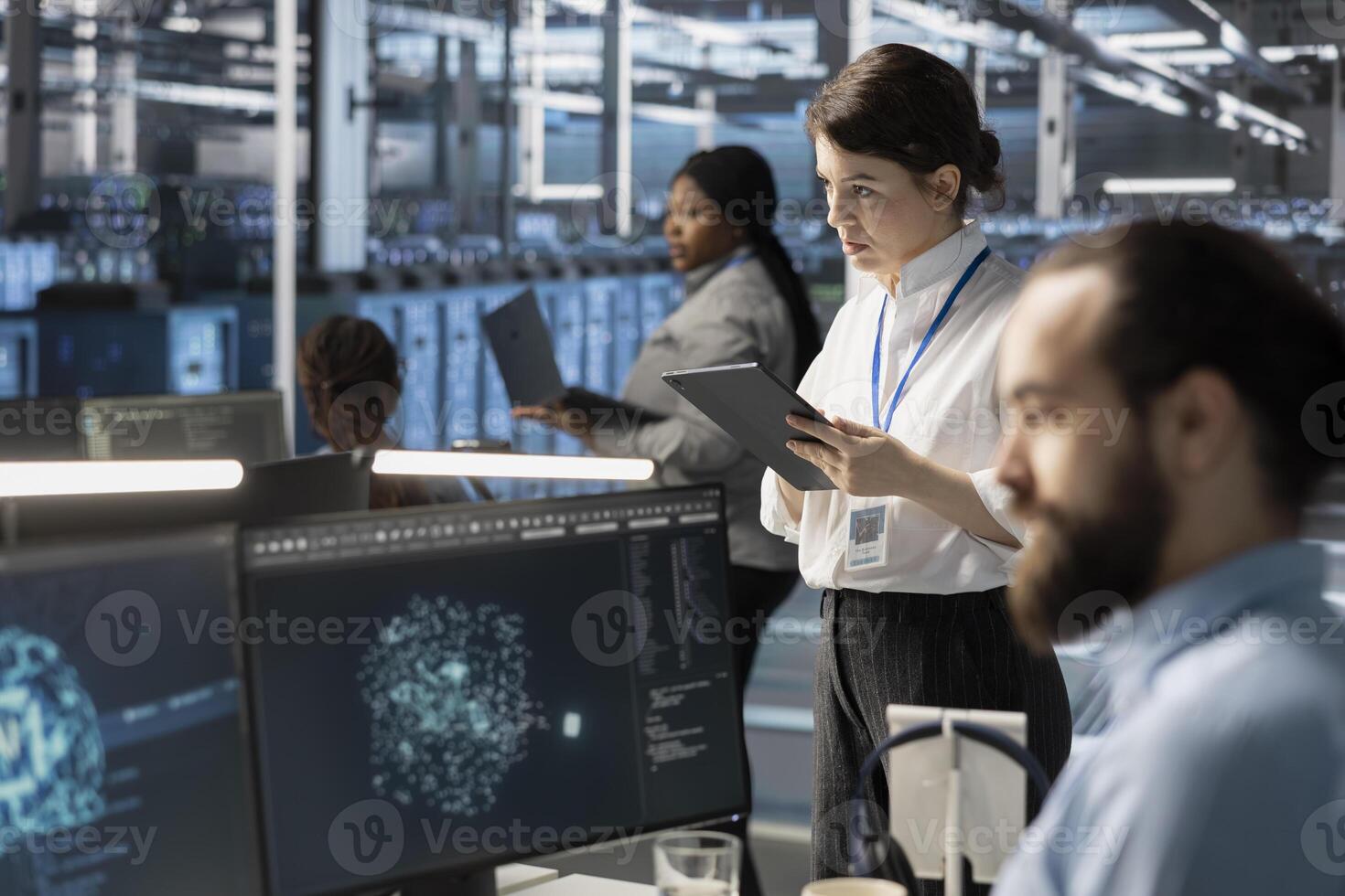 System administrators in data center integrating AI driven automation tools, doing maintenance. Staff members in server room using artificial intelligence machine learning models photo