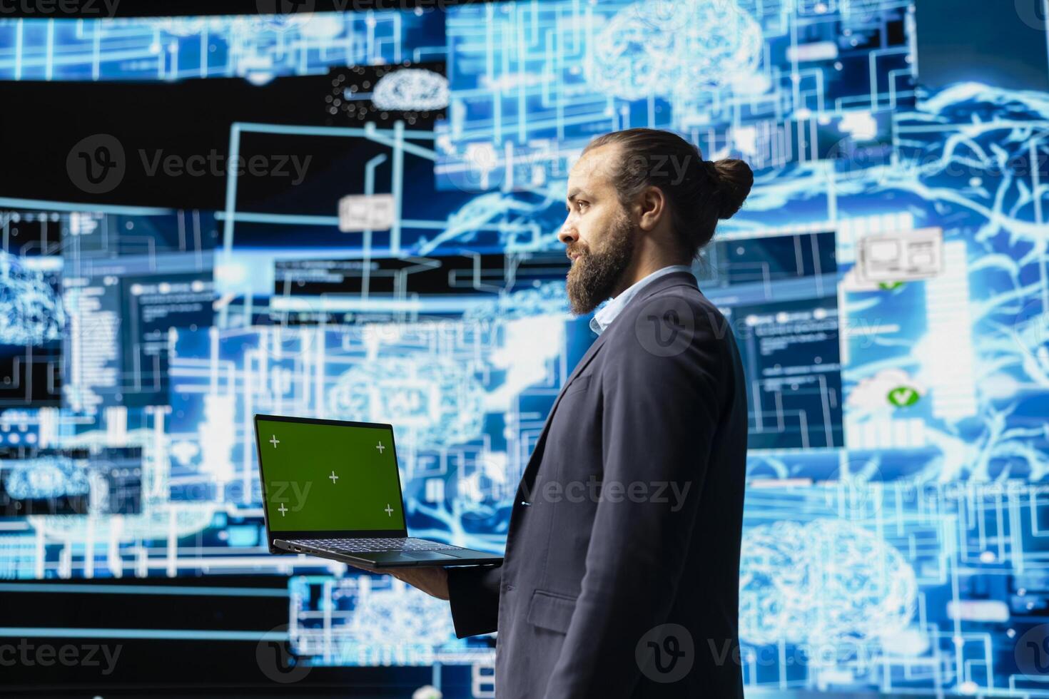 Business administrator uses mockup display next to AI neural networks system, practicing machine learning and cloud computing. Young man implementing artificial intelligence brain. photo