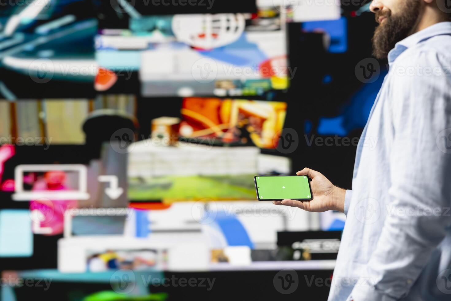 Young influencer checks phone with mockup screen for activity on social media platforms, leveraging innovation and mobile technology to maintain engagement and build a community. Social network. photo
