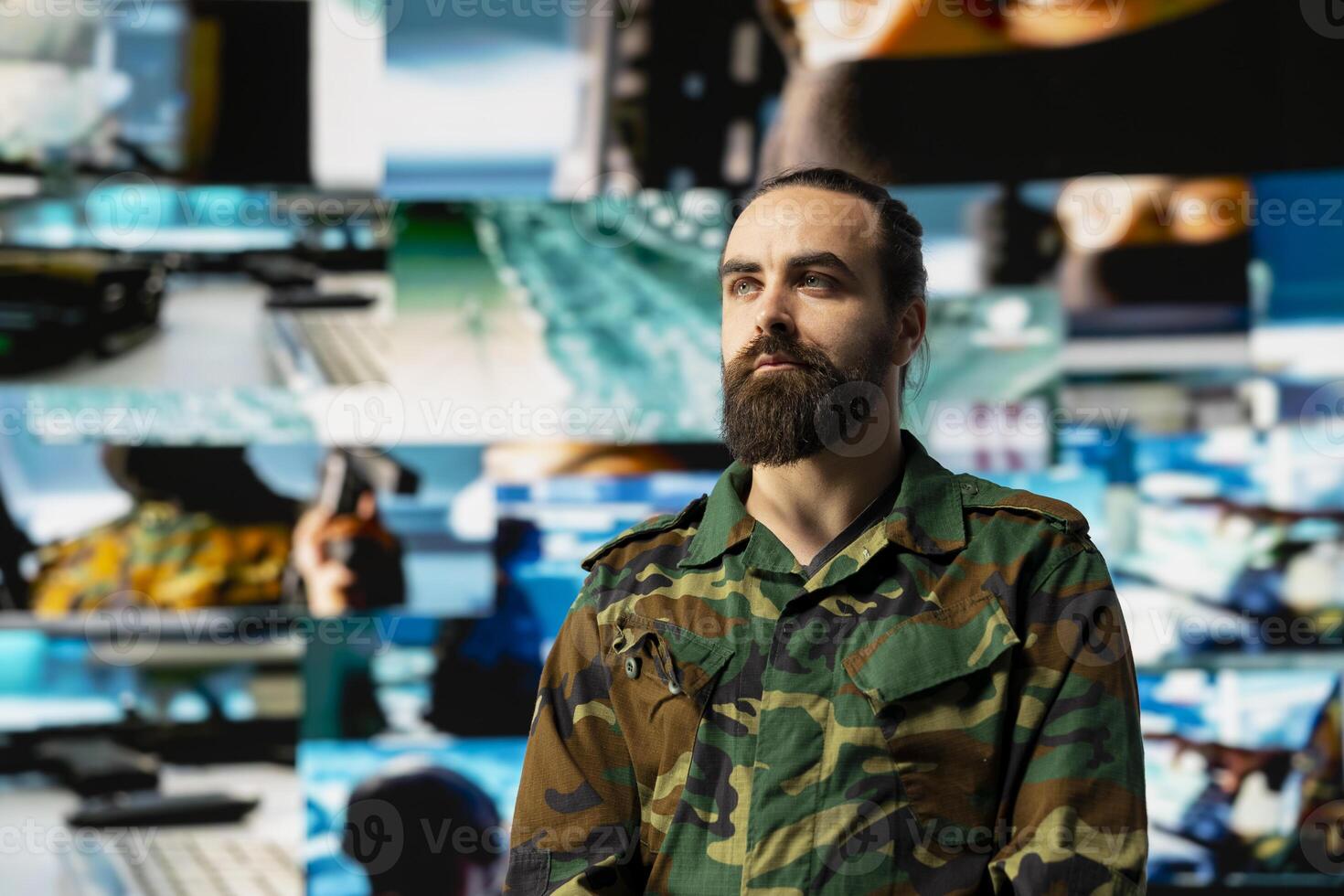 Armed forces officer monitoring drone and satellite imagery to gather intelligence, collecting insight for war planning. Support mission control and secure global operations through cyber defense. photo