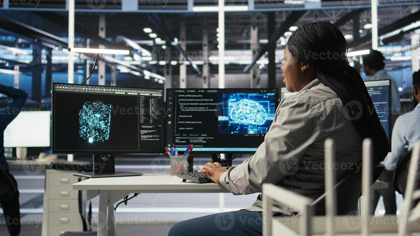 Computer scientist using artificial intelligence deep learning models to configure hardware. IT specialist using AI programming languages on PC in server farm, optimizing system, camera A photo