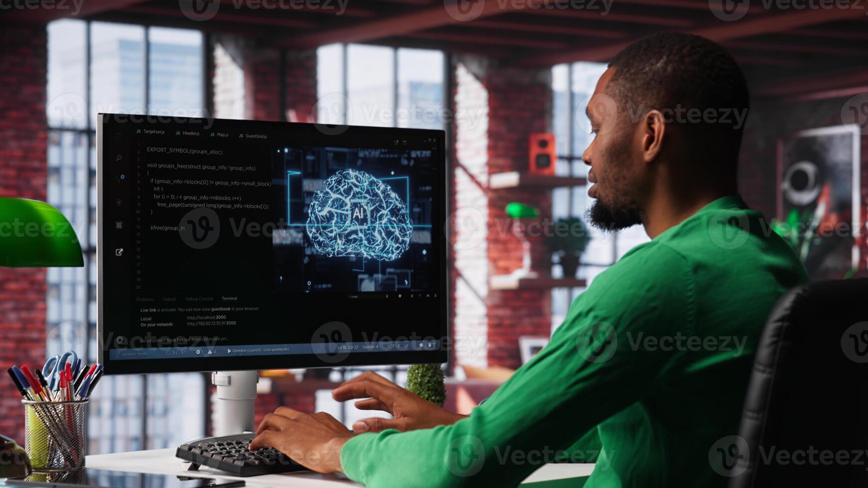 System administrator programming AI brain computerized model of neural network for machine learning. Debugging software algorithm and checking for errors. Camera A. photo