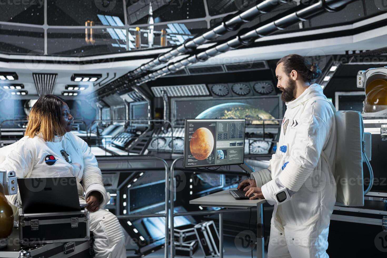 Cosmonaut running data analysis on monitor before Mars expedition, preparing for future of mankind. Astronaut looks at interface showing orbital path, exploring red planet to support human life photo