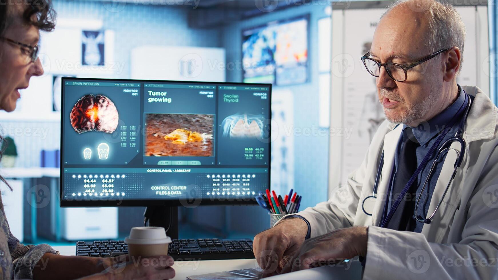 Specialist and old woman discuss x ray scan for preventive cancer medicine and health awareness. Cancer expert provides geriatric patient with insights into tumor risks. Camera A. photo