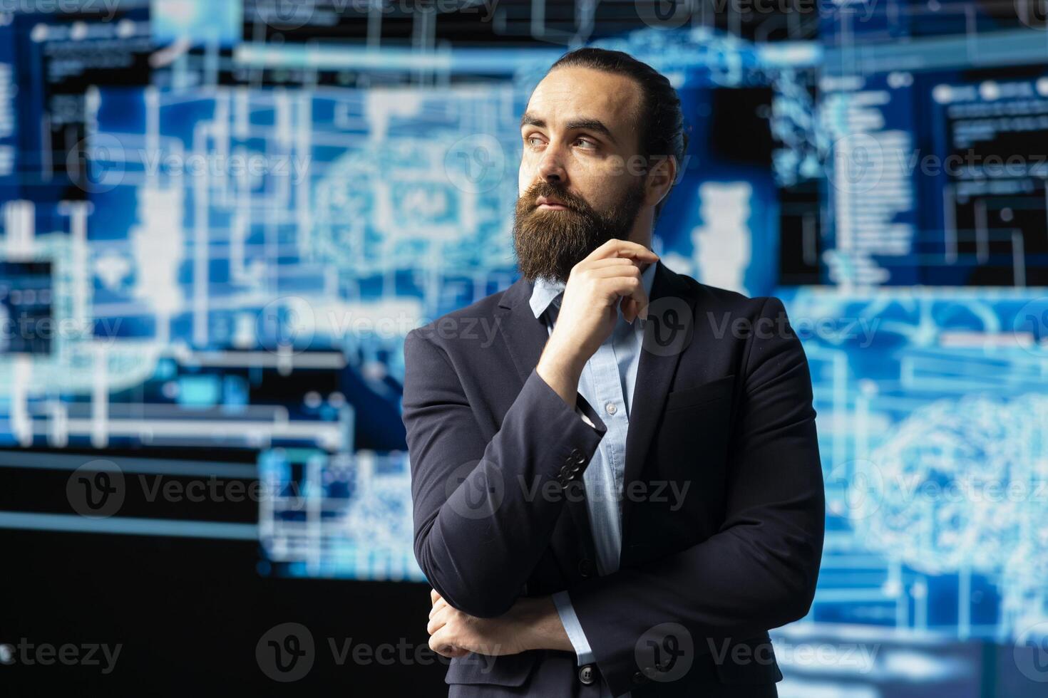Young businessman studies artificial intelligence neural network on dashboards, using high tech automation tools for coding, analytics and machine learning for strategic development. photo