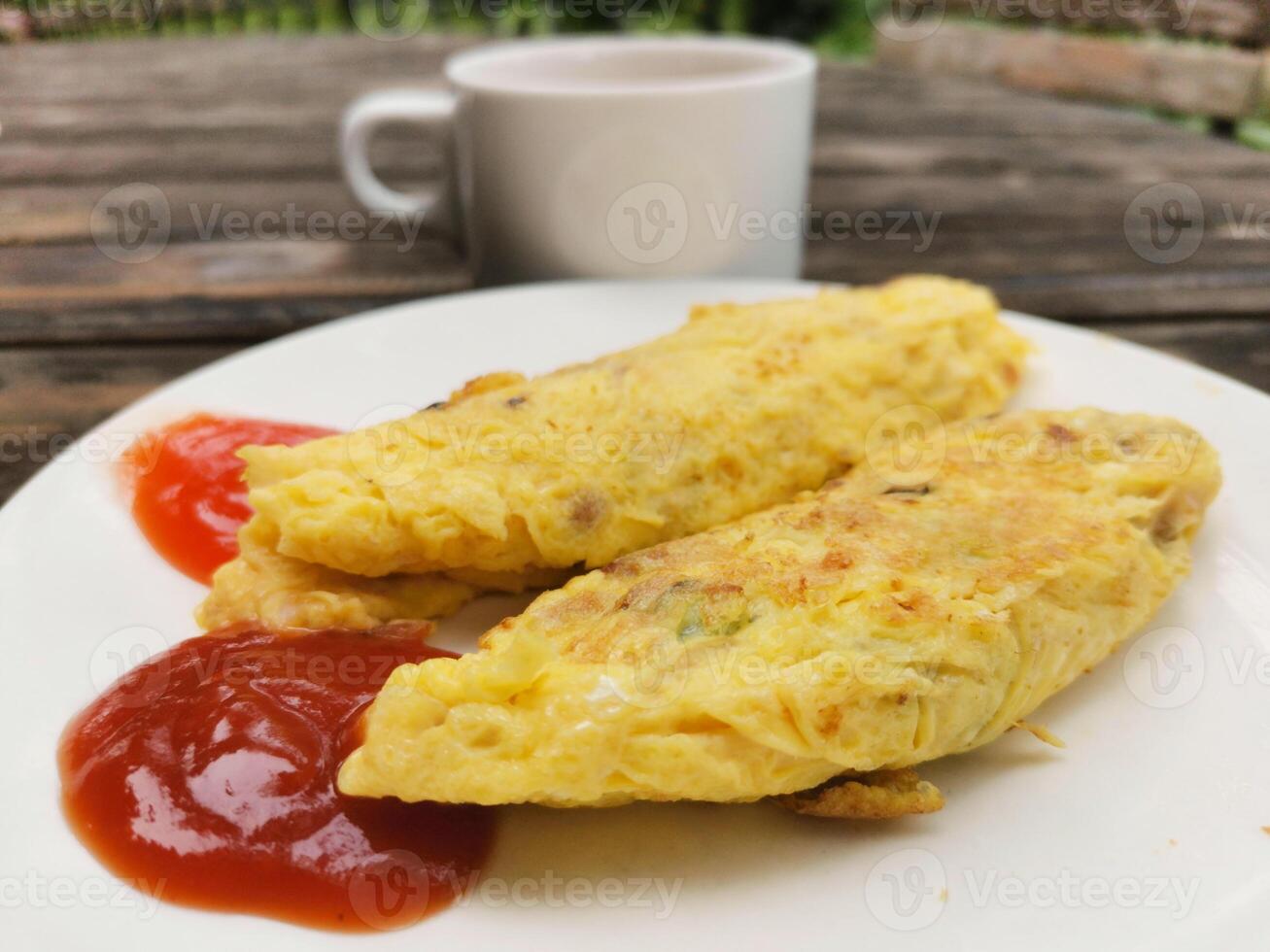 Delicious Omelette with Tomato Sauce and Coffee for Breakfast. Breakfast at the hotel. Food photography concept. Selective focus. Copy space. photo