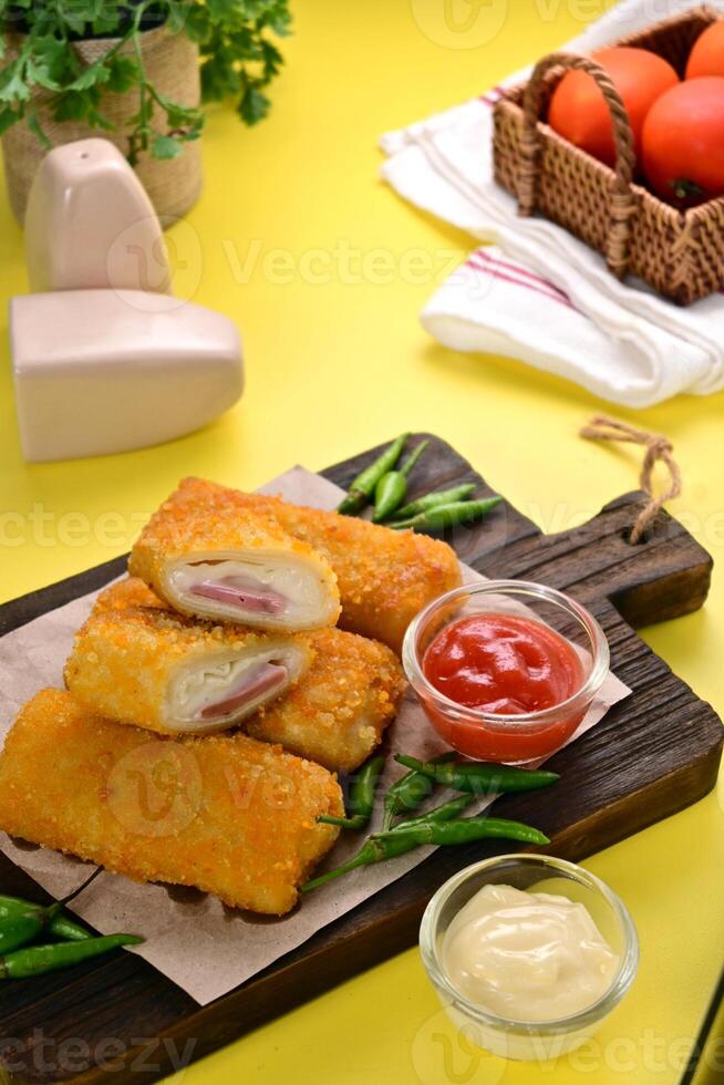 Risol Mayo is traditional snacks in the form of rolls with various fillings, from ragout, eggs to smoked beef. photo