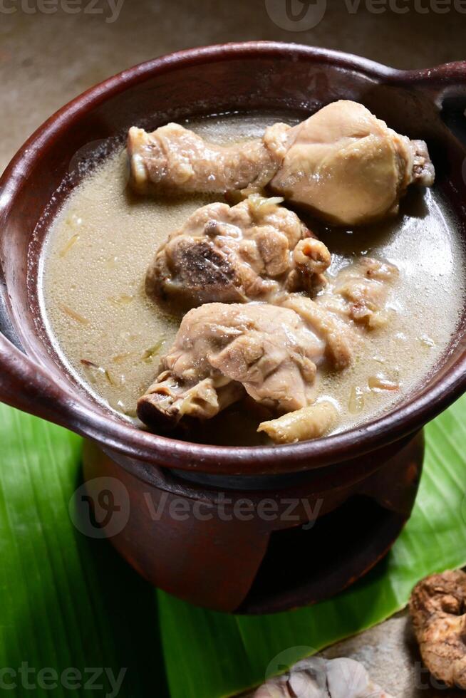 Opor ayam is boiled chicken which is given thick spices from coconut milk which is added with spices such as lemongrass, kencur, and so on. In the Eid celebrations it is usually made festive. photo