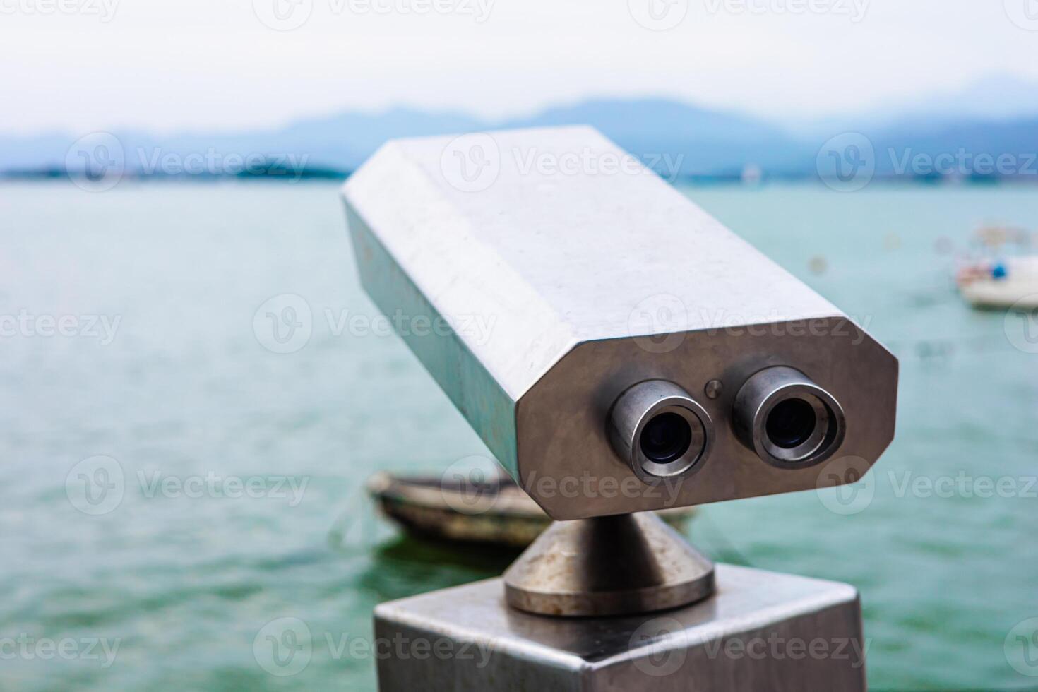 Views from coastal lookout near water with boat in the distance photo