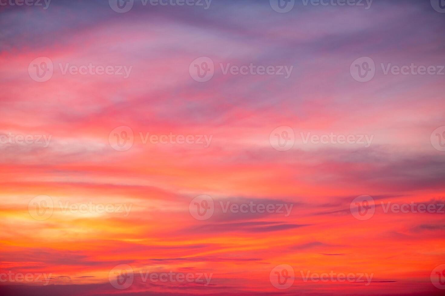 Sky,Beautiful sunset view, luxury soft gradient orange gold clouds and sunlight on the blue dramatic sky perfect for the background, morning, evening,Twilight, climate change,horizontal sunset photo