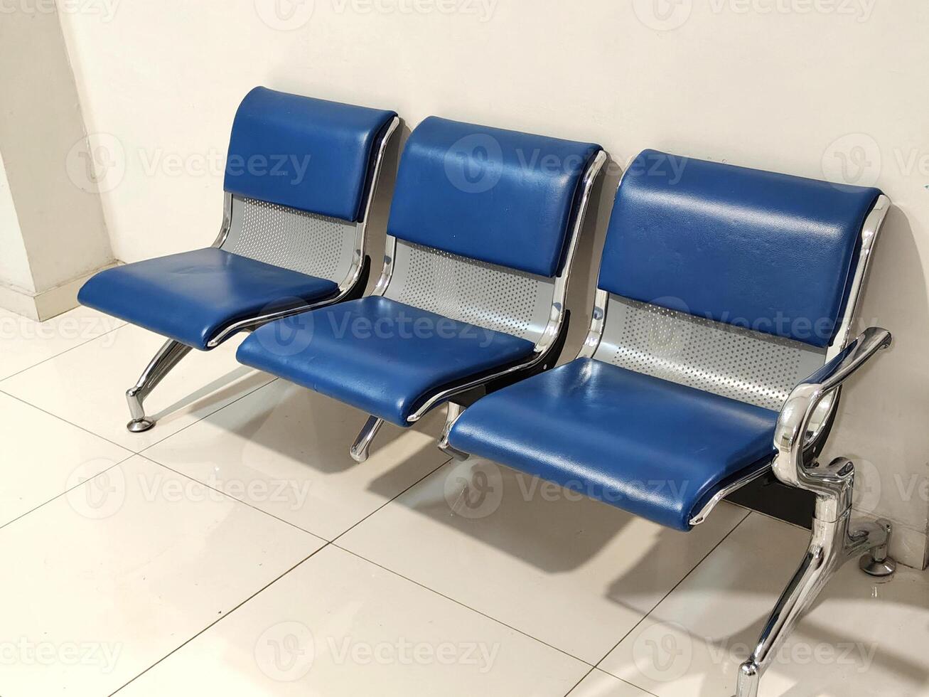 modern row of chairs in waiting room of hospital. photo