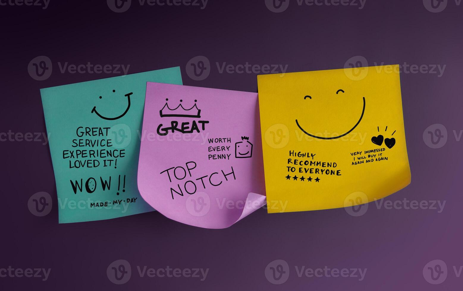 Customer feedback notes with smiley faces and handwritten compliments reflect positive reviews and satisfaction in service experience. photo