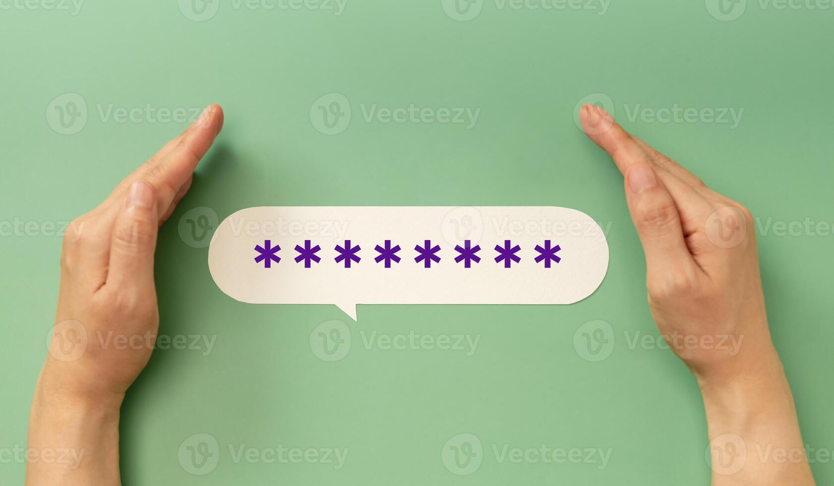 Hands protecting a hidden password speech bubble symbolizing online security and privacy in digital communication photo